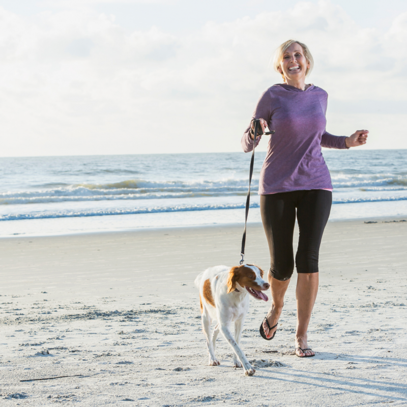 Peripheral Neuropathy patient enjoys walking her dog after acupuncture treatments